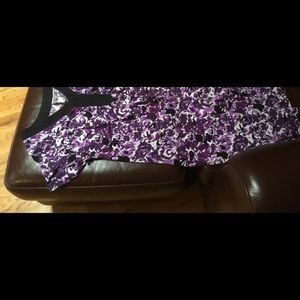 Short sleeve dress, polyester of some sort.  I lost weight.